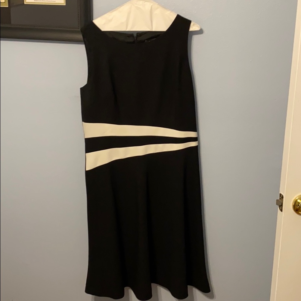 Beautiful black with cream accents cocktail dress.